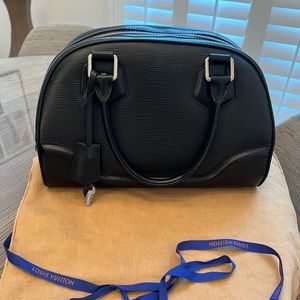 Louis Vuitton Bowling Montaigne PM features an epi leather body